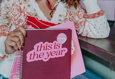 owner reading her planner