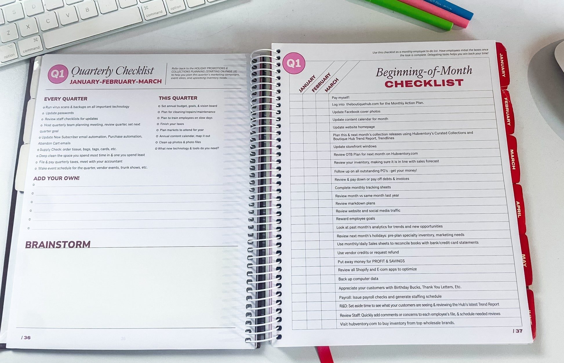 Open planner with checklists on a desk with office supplies